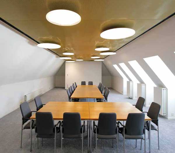 Gold-anodized aluminum mesh ceiling. Konig Von England Inn, Stuttgart Germany